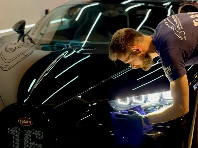 Professional ceramic coating application on a vehicle in Dubai