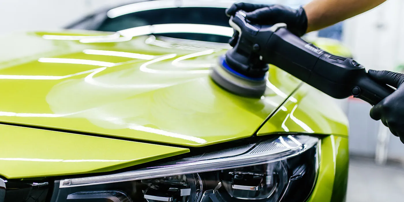 Professional paint correction and machine polishing on a vehicle in Dubai